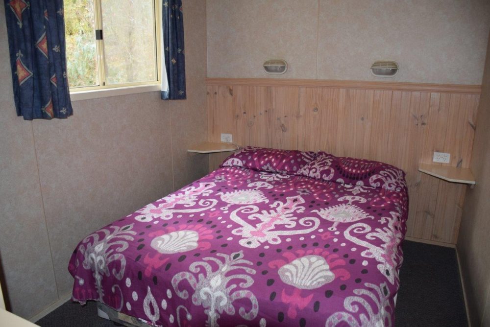 The cabin's main bedroom double bed had an electric blanket