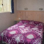 The cabin's main bedroom double bed had an electric blanket