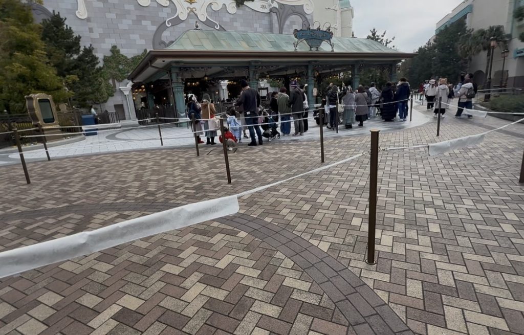 A small queue of check in guests waiting for opening time at the Fantasy Springs Hotel park entry
