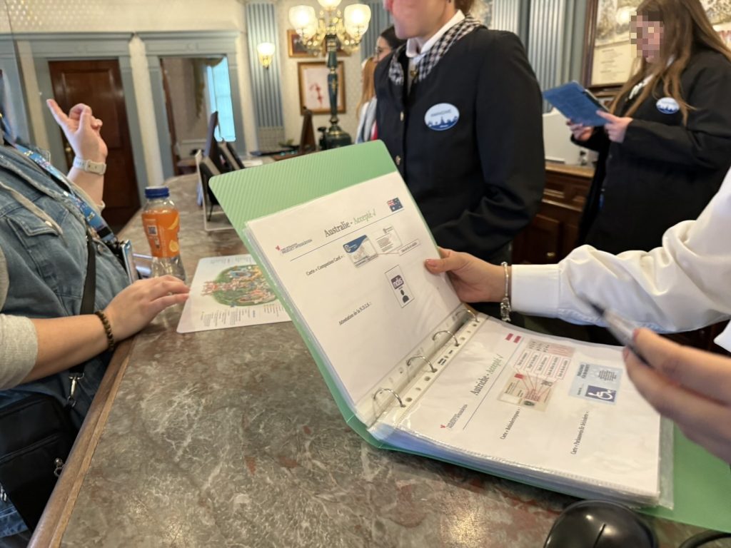 Guest Services checking Australian disability documents